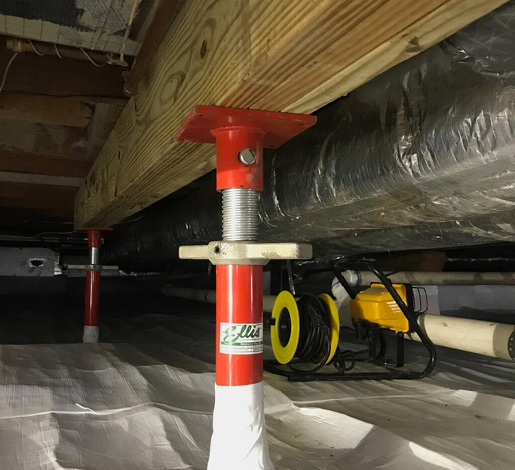 Crawl space repair improving structural support beneath a residential home